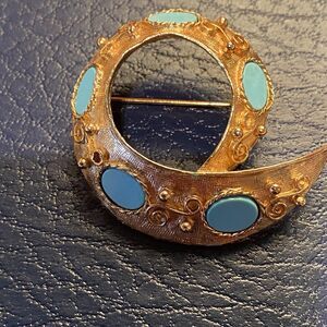 Vintage Gold Tone Crescent Brooch Pin Blue Cabochon Stones Swirl Textured Design
